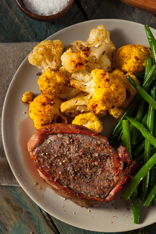 Bacon wrapped Filet with Spicy Cauliflower and Green Beans